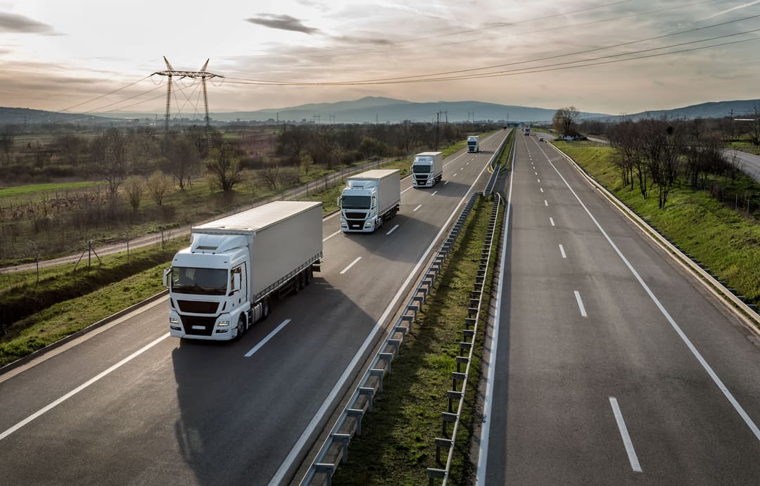 Truck loaded with goods on the highway, symbolizing reliable transportation and logistics services